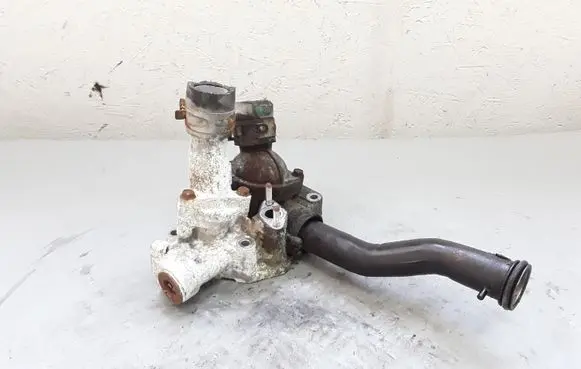 Thermostat/thermostat housing