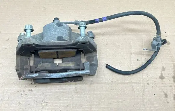 Hyundai Tucson IV NX4 Front brake caliper 58130N7100