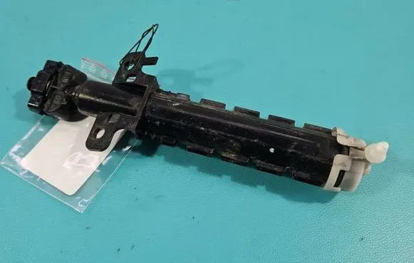 Headlight washer spray nozzle