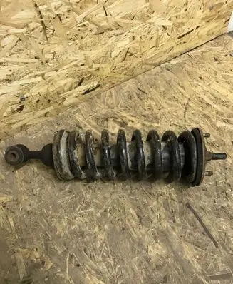 Nissan Navara D40 Front shock absorber with coil spring