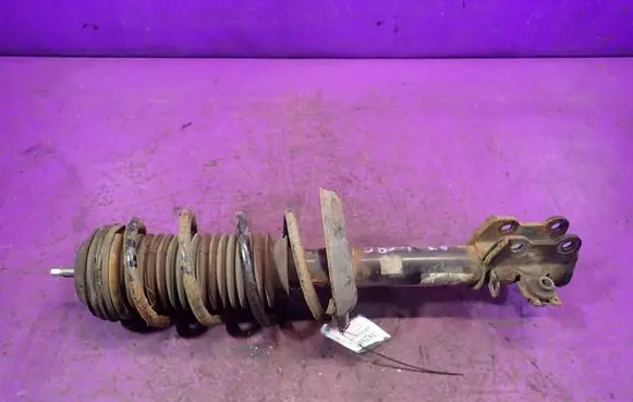 Opel Corsa D Front shock absorber with coil spring 