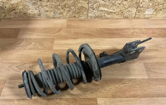Citroen C4 I Front shock absorber with coil spring 