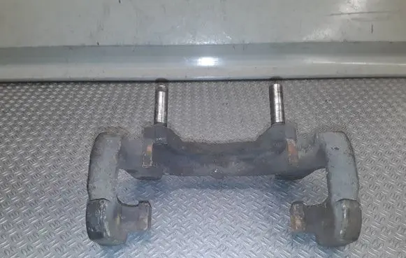 Volvo S80 Front Brake Caliper Pad/Carrier 
