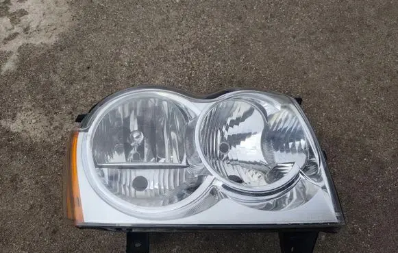 Jeep Grand Cherokee (WK) Headlight/headlamp 55156672AG