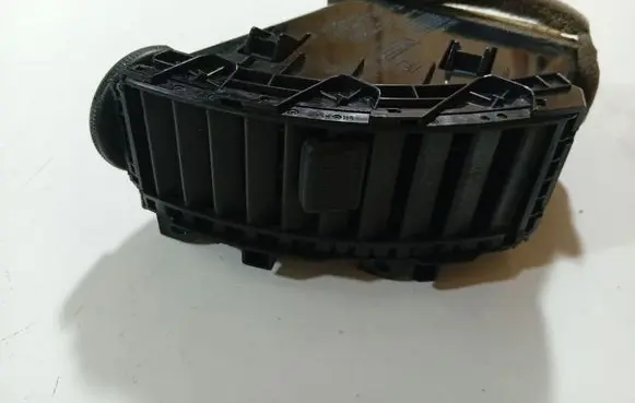 Nissan Note (E11) Dash center air vent grill 887519U00B