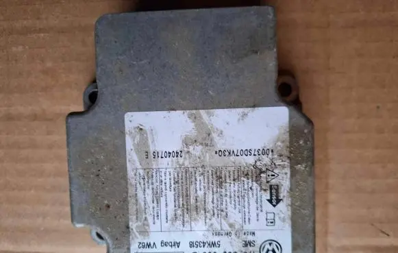 Volkswagen Touran I Airbag control unit/module 1T0909605B 5WK43518 07H023S1400