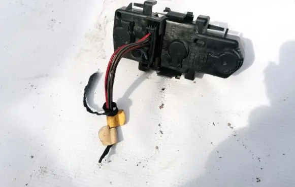 Tail light bulb cover holder
