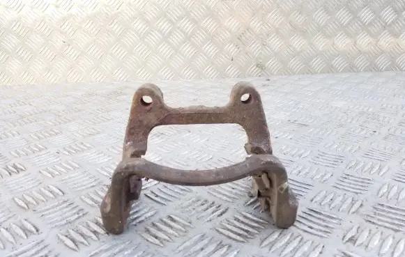 Volkswagen PASSAT B6 Brake caliper pad carrier rear 