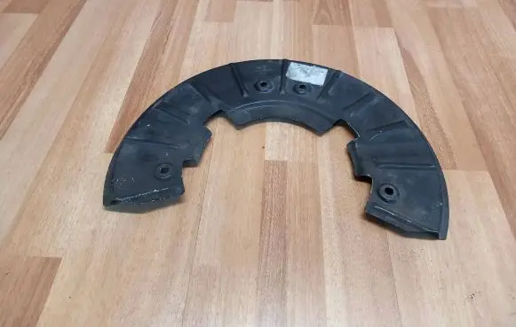 Volkswagen Touareg I Front brake disc dust cover plate 7L0615311B