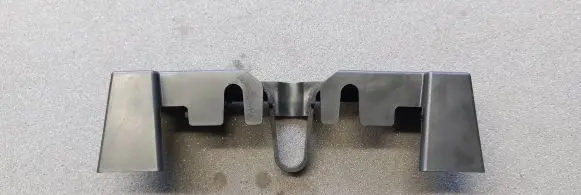 Engine bonnet/hood lock trim molding
