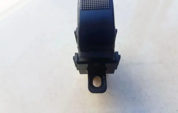 Mazda 626 Front door window switch trim 