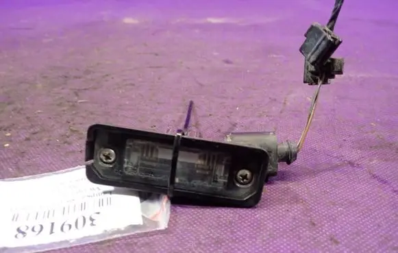 Volkswagen Golf IV Number plate light 1J6943021B