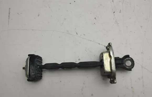 Front door check strap stopper