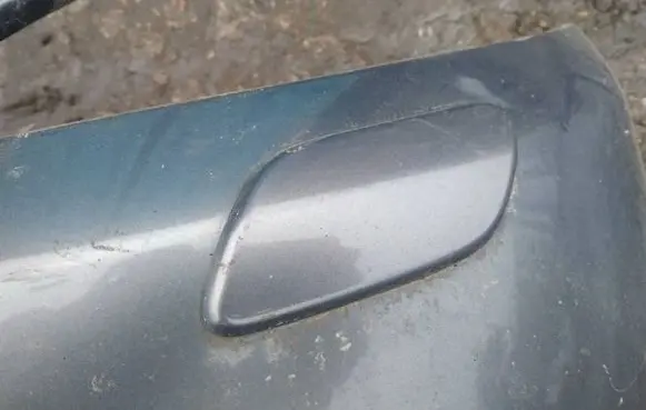 Headlight washer spray nozzle cap/cover