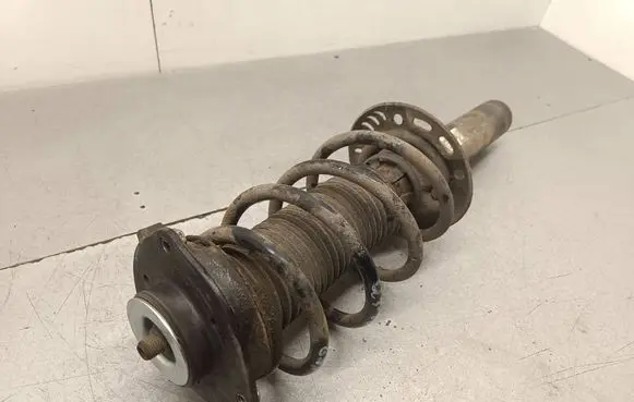 Audi Q3 8U Front shock absorber with coil spring 5N0413031AE