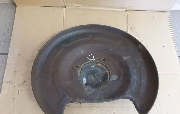 Opel Astra J Rear brake disc plate dust cover 