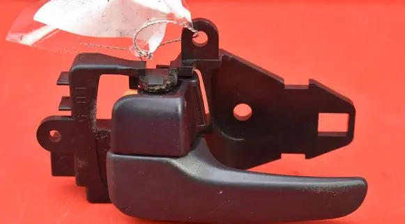 Mitsubishi Lancer VIII Front door interior handle MN105359