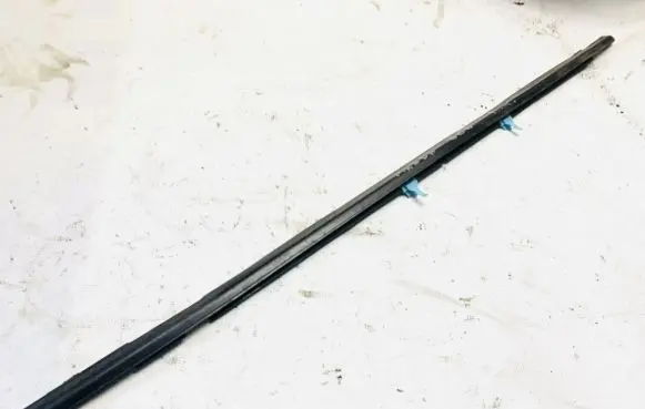 Mazda 626 Front door glass trim molding 
