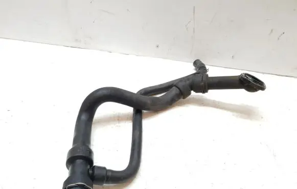 Volkswagen PASSAT B5 Engine coolant pipe/hose 8D0121055J