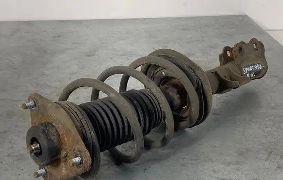 KIA Sportage Front shock absorber with coil spring 546603U000