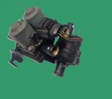 Coolant heater control valve