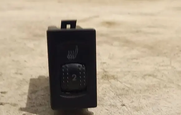 Seat heating switch