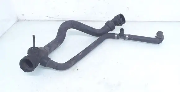 Volkswagen PASSAT B5 Engine coolant pipe/hose 8D0121049H