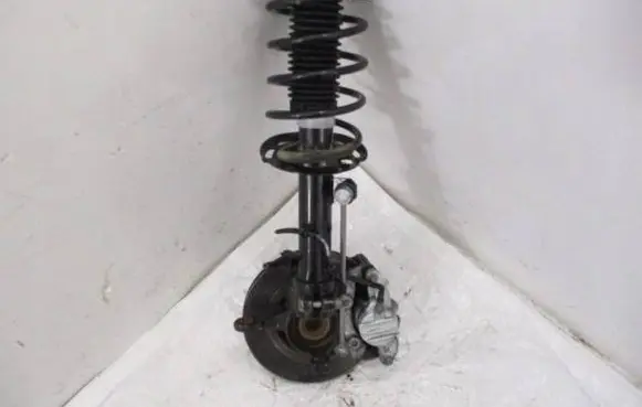 Front wheel hub spindle knuckle