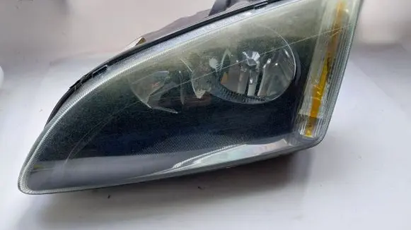 Ford Focus Headlight/headlamp FRONTLEFT 4M5113W030JD
