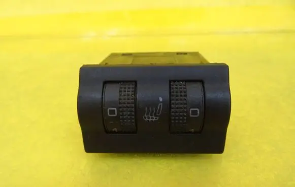 Seat heating switch