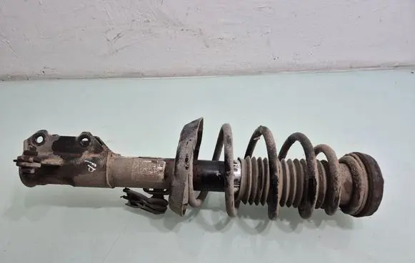 Opel Astra J Front shock absorber with coil spring 