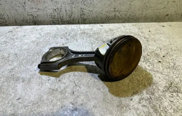 Piston with connecting rod