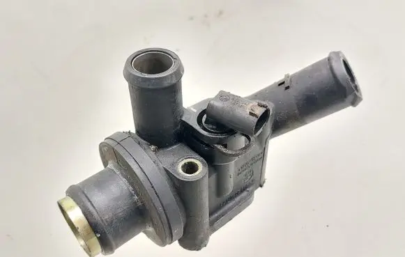 Thermostat/thermostat housing