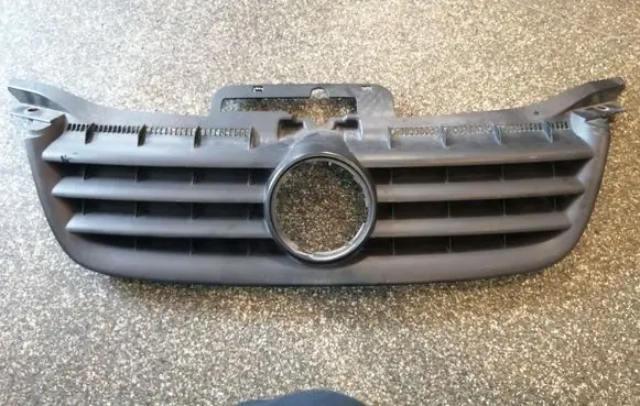 Volkswagen Touran I Front bumper upper radiator grill 1T0853651A