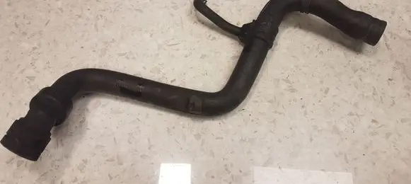 Volkswagen PASSAT B5 Engine coolant pipe/hose 8D0121101J