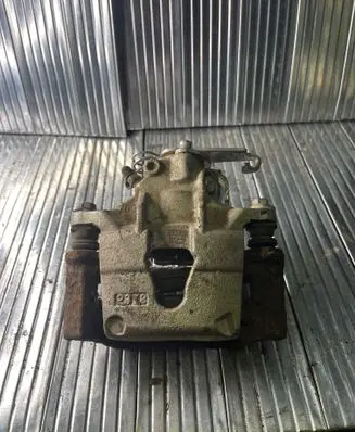 Nissan Interstar Brake caliper pad carrier rear 4400100QAA 009111463 009121377