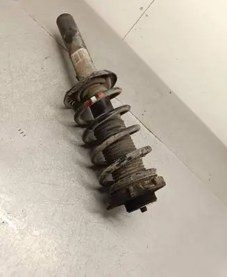 Front shock absorber with coil spring