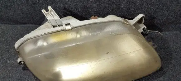 Mazda 323 Headlight/headlamp 11061732