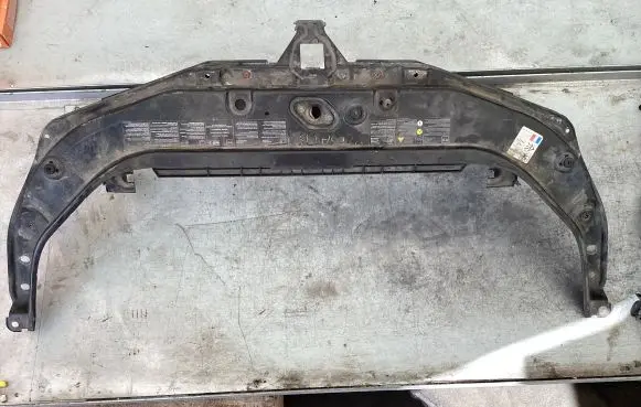 Radiator support slam panel bracket
