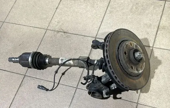 Front wheel hub spindle knuckle