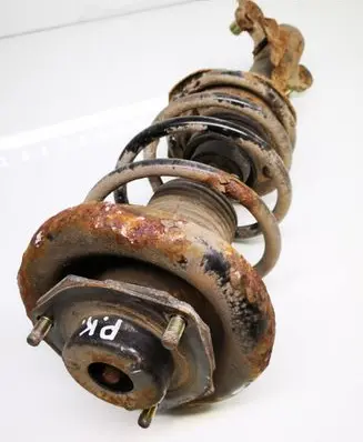 Nissan Primera Front shock absorber with coil spring