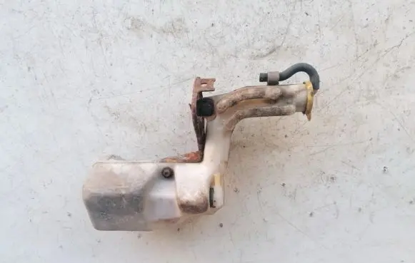 Mazda 323 Windshield washer fluid reservoir/tank