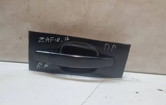 Opel Zafira B Front door exterior handle 24463524