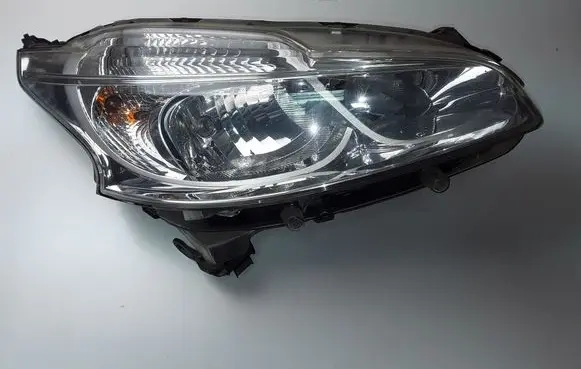 Peugeot 208 I Headlight/headlamp 9802221380
