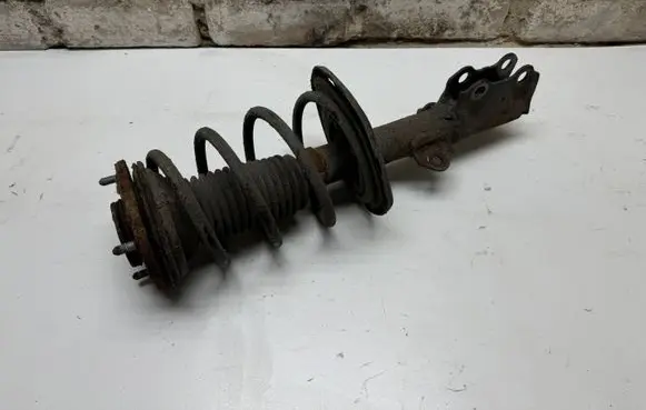 Toyota Avensis T270 Front shock absorber with coil spring