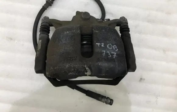 Volkswagen Touran III Front brake caliper