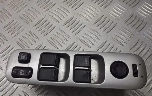 Suzuki Liana Front door window switch trim 