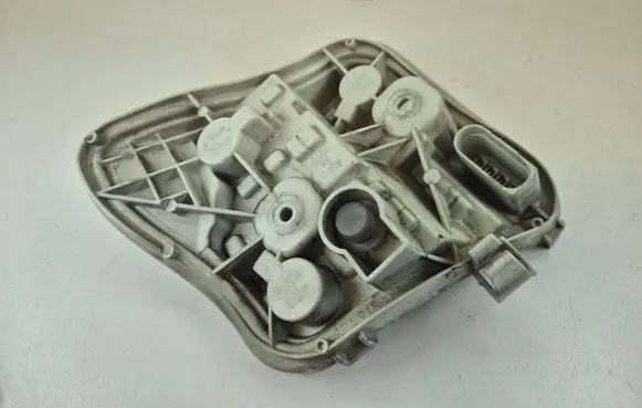 Tail light bulb cover holder