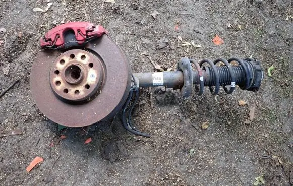 Volkswagen Golf V Front shock absorber with coil spring 1T0413031EQ