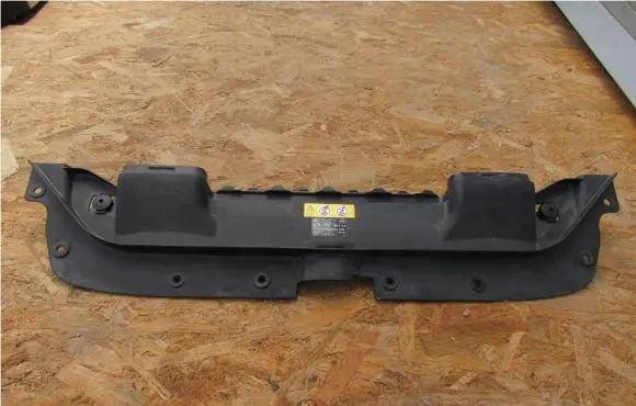 Engine bonnet/hood lock trim molding